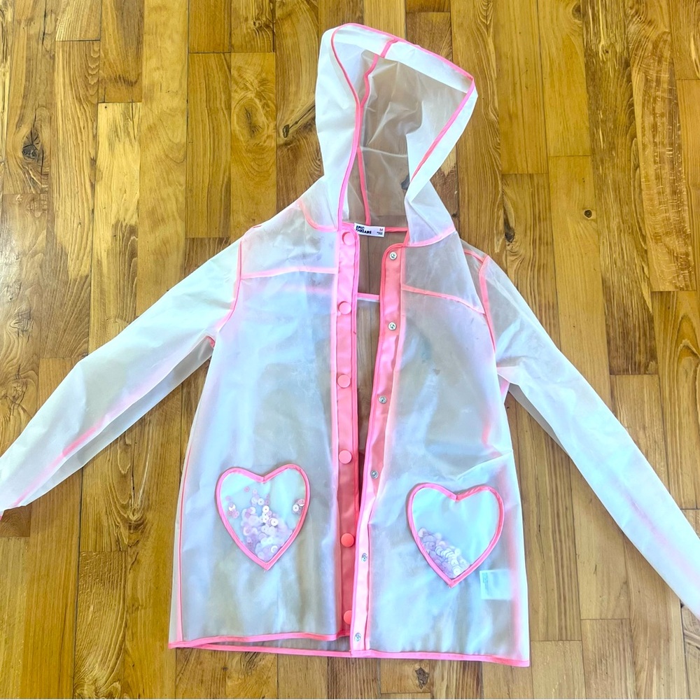 See-through and pink rain jacket
